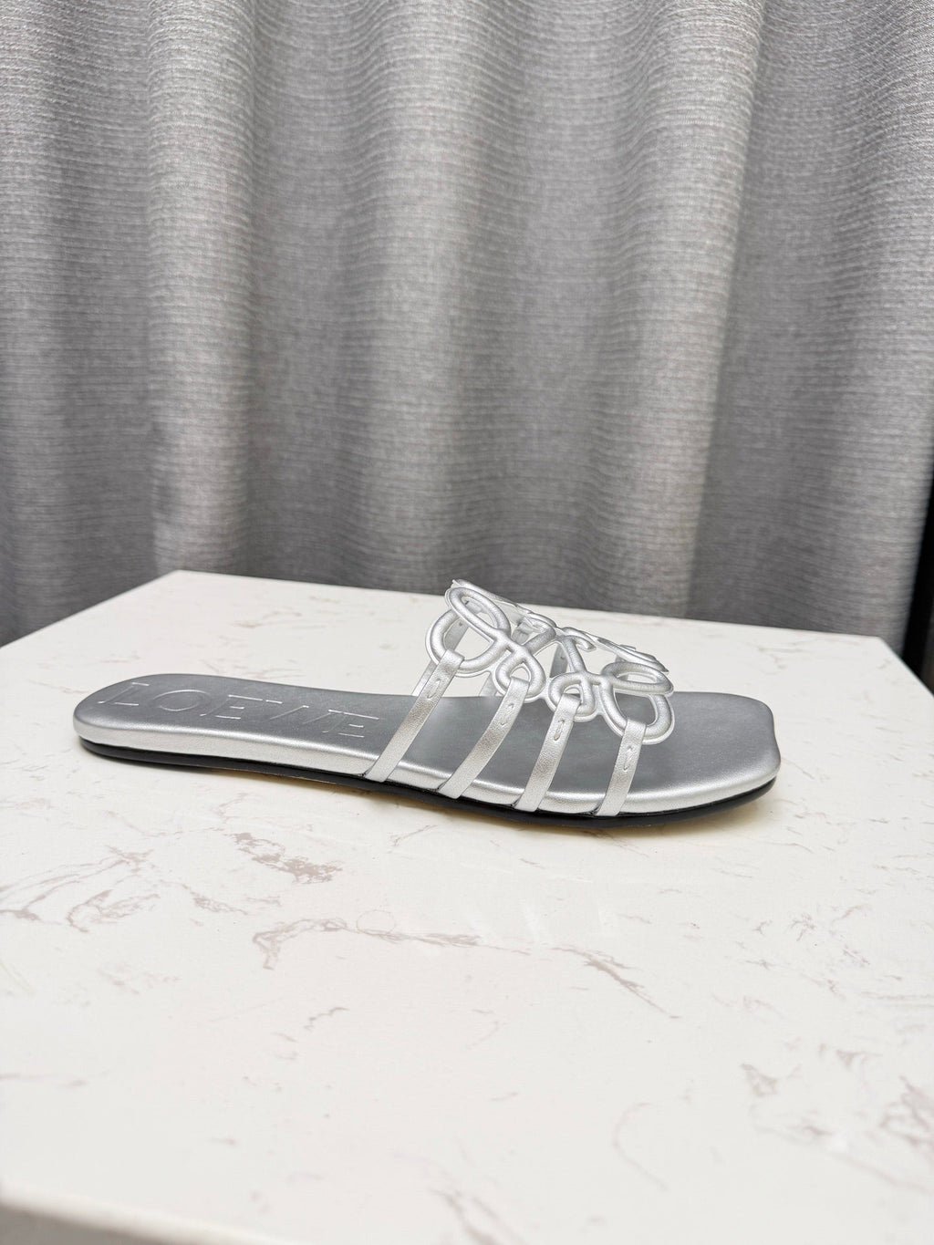 LOEWE 26S PETAL ANAGRAM SLIDE IN SILVER SOFT CALFSKIN