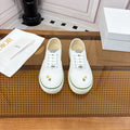 DIOR 26S LOW TOP SNEAKERS IN WHITE CANVAS WITH DAISY EMBROIDERY