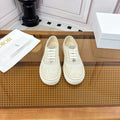 DIOR 26S LOW TOP SNEAKERS IN BEIGE CANVAS WITH WHITE LACE TRIM & LOGO PRINT