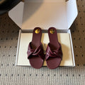 YSL 26S TWISTED-STRAP FLAT SANDALS IN DARK RED LAMBSKIN