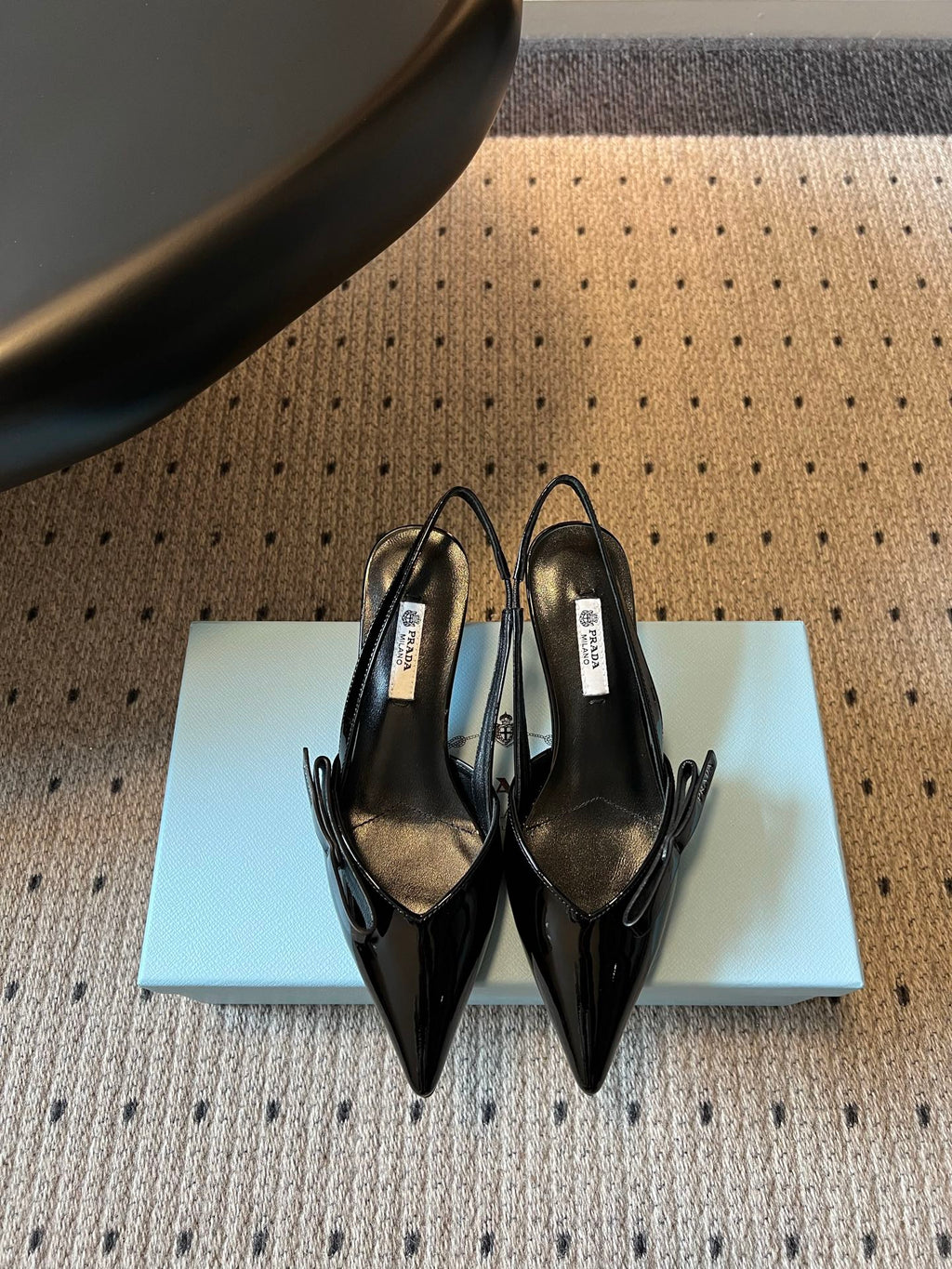 PRADA 26S BOW DETAIL SLINGBACK PUMPS 55MM IN BLACK PATENT CALFSKIN