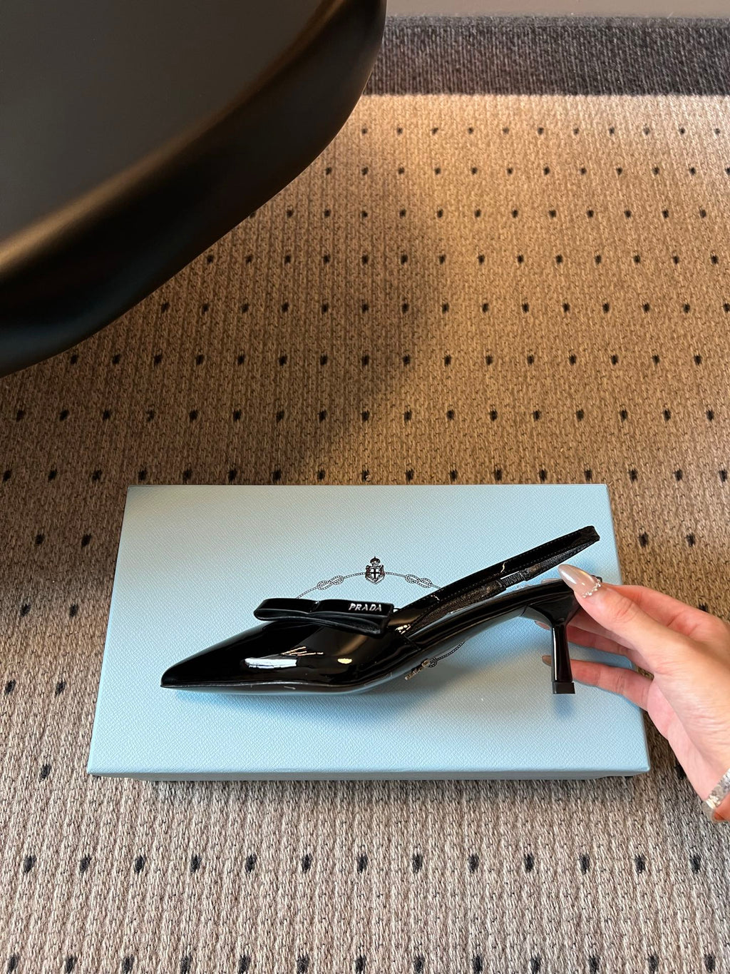 PRADA 26S BOW DETAIL SLINGBACK PUMPS 55MM IN BLACK PATENT CALFSKIN