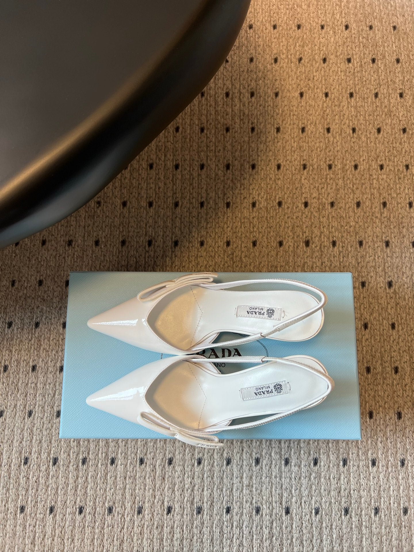 PRADA 26S BOW DETAIL SLINGBACK PUMPS 75MM IN WHITE PATENT CALFSKIN
