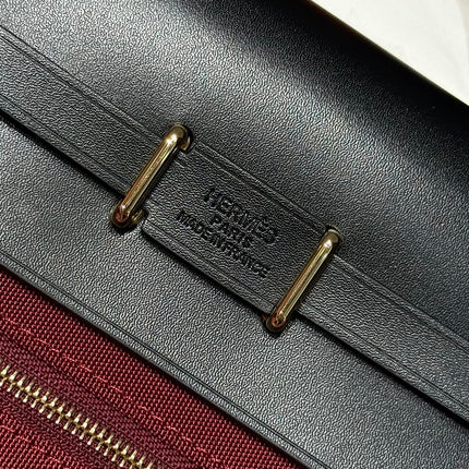 HERMES 25S MINI HERBAG 20 IN RED AND BLACK CANVAS GOLD HARDWARE