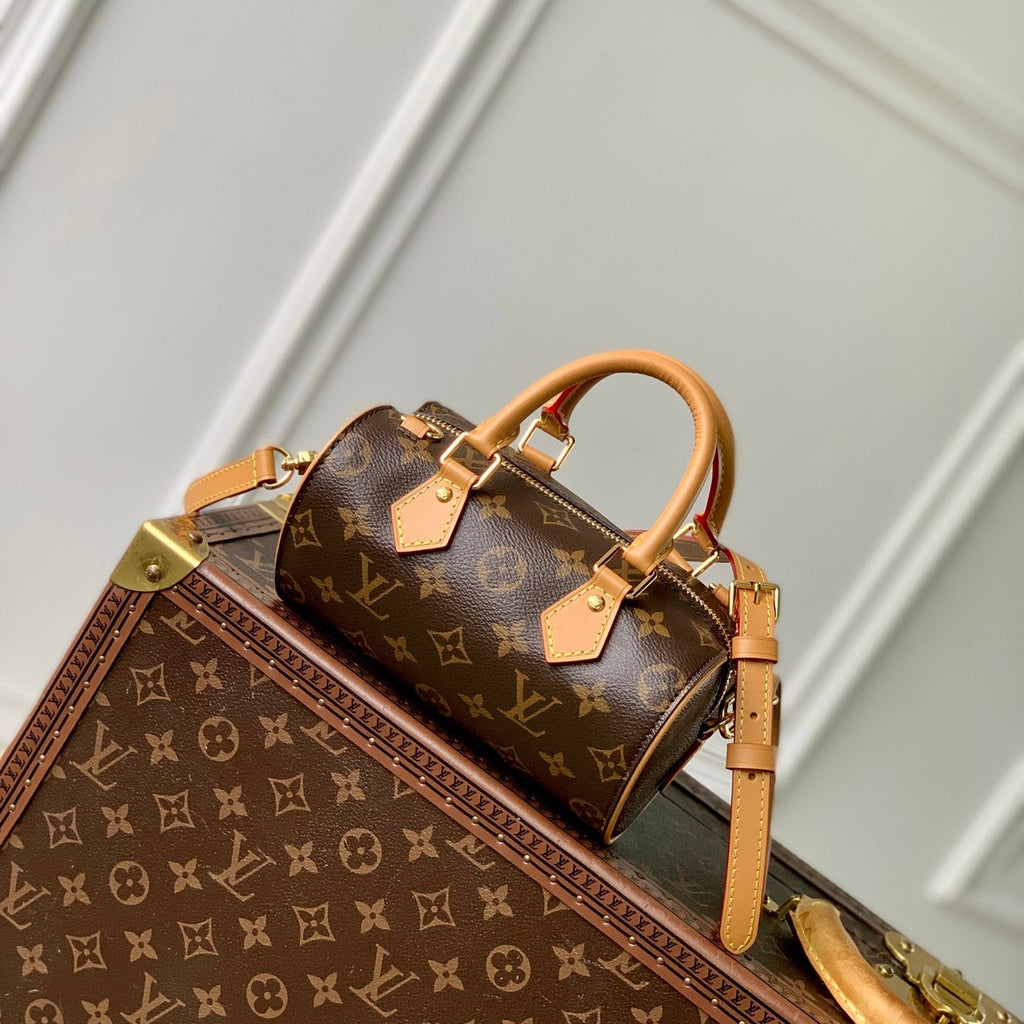 NANO SPEEDY DATING 18 IN BROWN COATED CANVAS GOLD HARDWARE