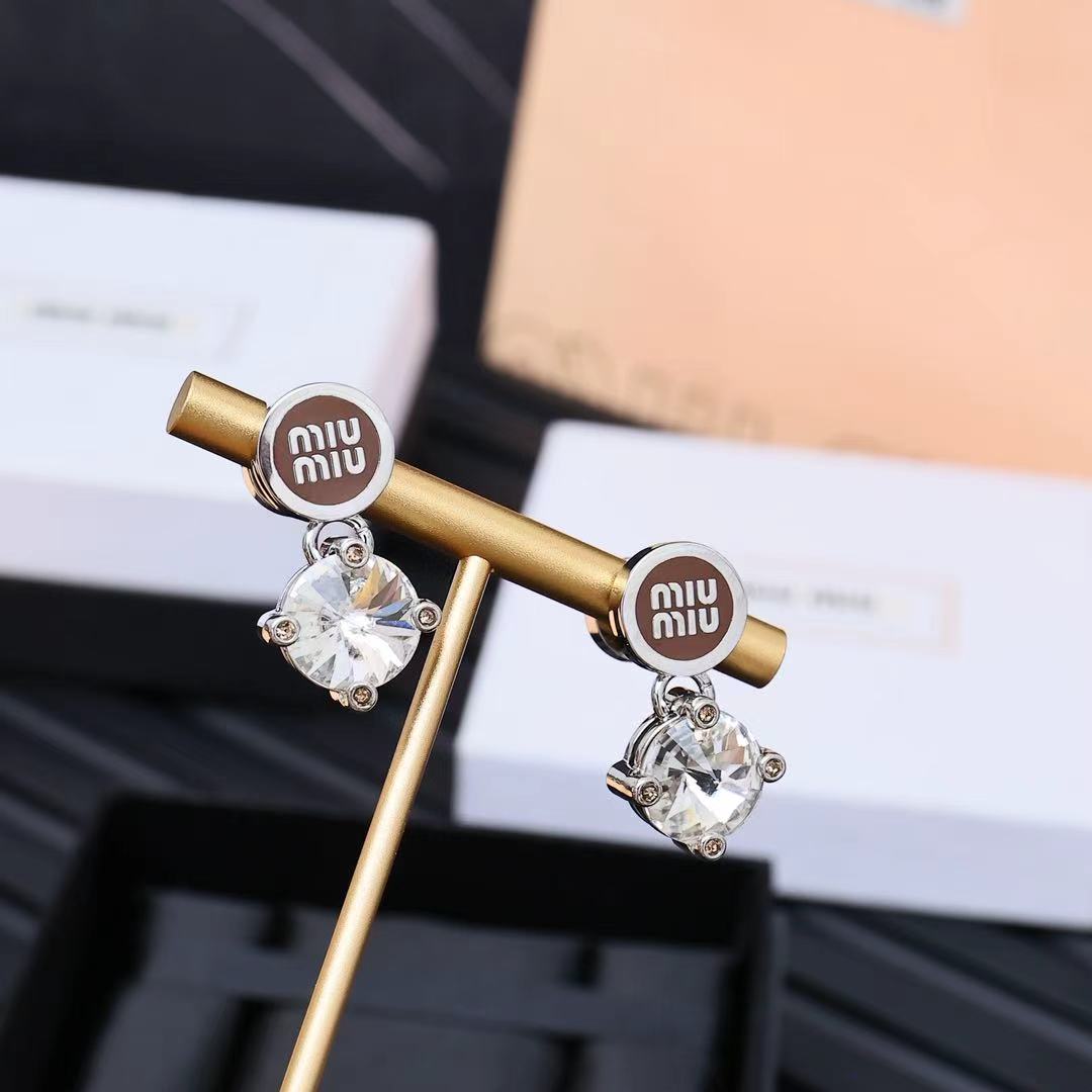 MIUMIU 26S CRYSTAL DROP LOGO STUD EARRINGS IN SILVER TONE METAL 626892