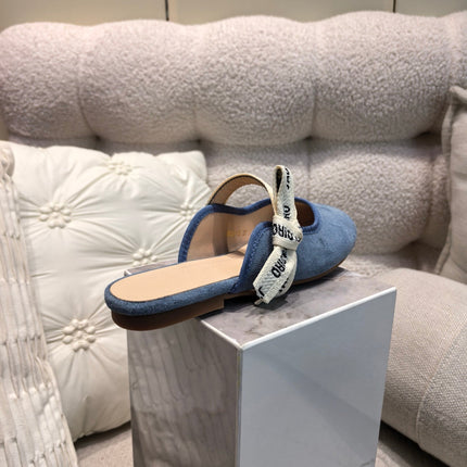 DIOR 26S FLAT MULES IN BLUE SUEDE WITH J'ADIOR BOW