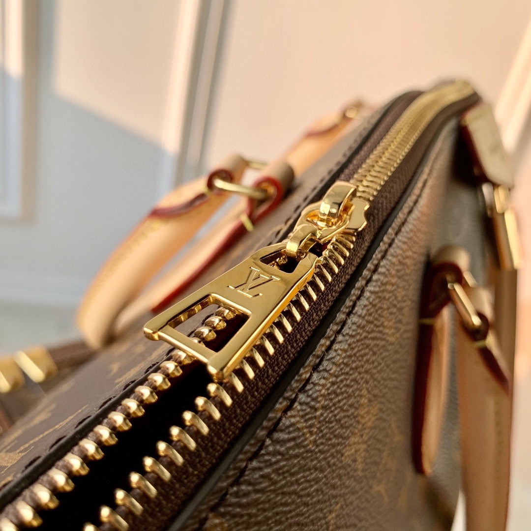 BOÉTIE PM TOTE 31.5 IN BROWN MONOGRAM COATED CANVAS AND CALFSKIN