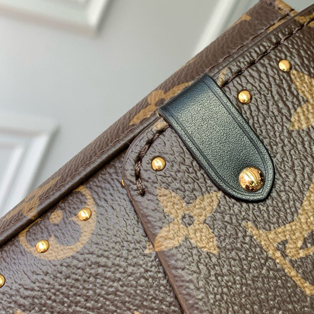 TRUNKIE 27 IN BROWN COATED CANVAS BLACK CALFSKIN SIGNATURE S-LOCK