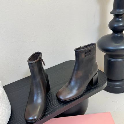 MIUMIU 25S ANKLE BOOTS 65MM IN BLACK BROWN CALFSKIN