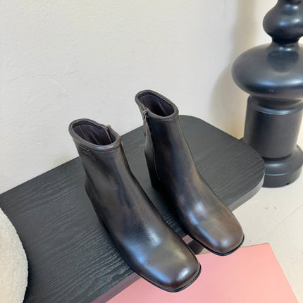 MIUMIU 25S ANKLE BOOTS 65MM IN BLACK BROWN CALFSKIN