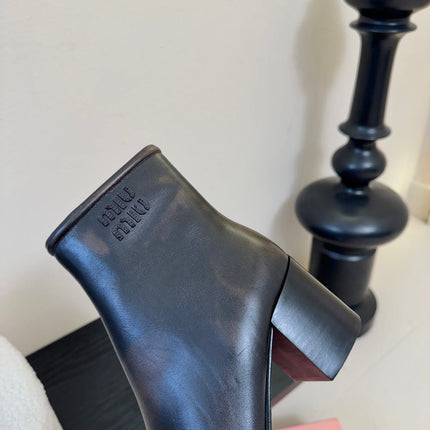 MIUMIU 25S ANKLE BOOTS 65MM IN BLACK BROWN CALFSKIN
