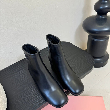 MIUMIU 25S ANKLE BOOTS 65MM IN BLACK CALFSKIN