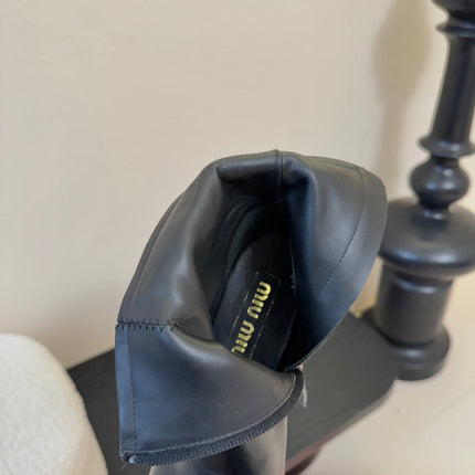 MIUMIU 25S ANKLE BOOTS 65MM IN BLACK CALFSKIN