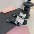 MIUMIU 26S FLAT SLIPPERS IN SILVER CALFSKIN