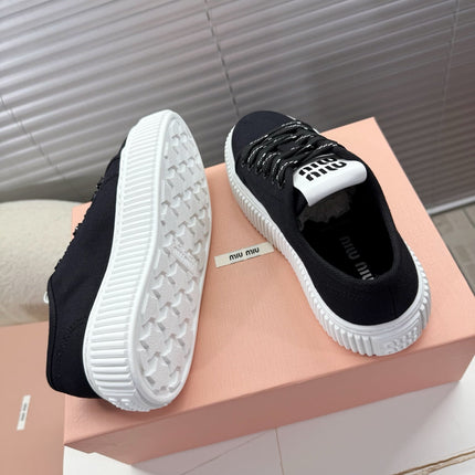 MIUMIU 26S PLATFORM SNEAKERS IN BLACK CANVAS