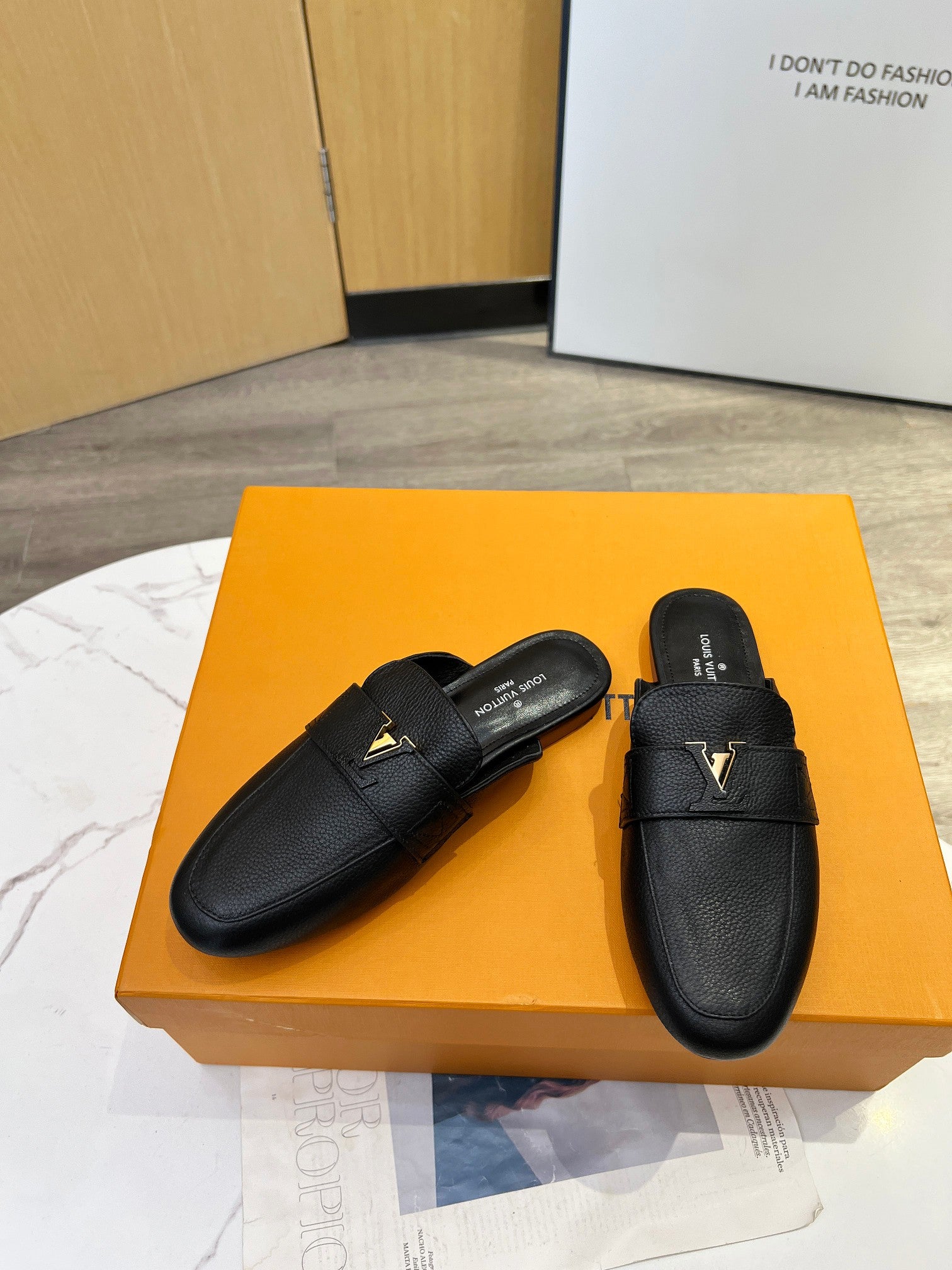 LV 26S MARE OPEN-BACK LOAFERS IN BLACK GRAINED CALFSKIN
