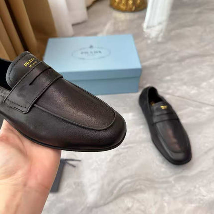 PRADA 25S LOAFERS IN BLACK CALFSKIN