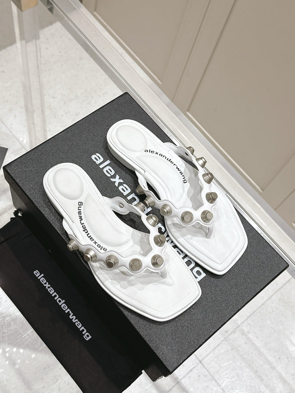 RHODES STUDDED THONG SANDALS IN WHITE CALFSKIN