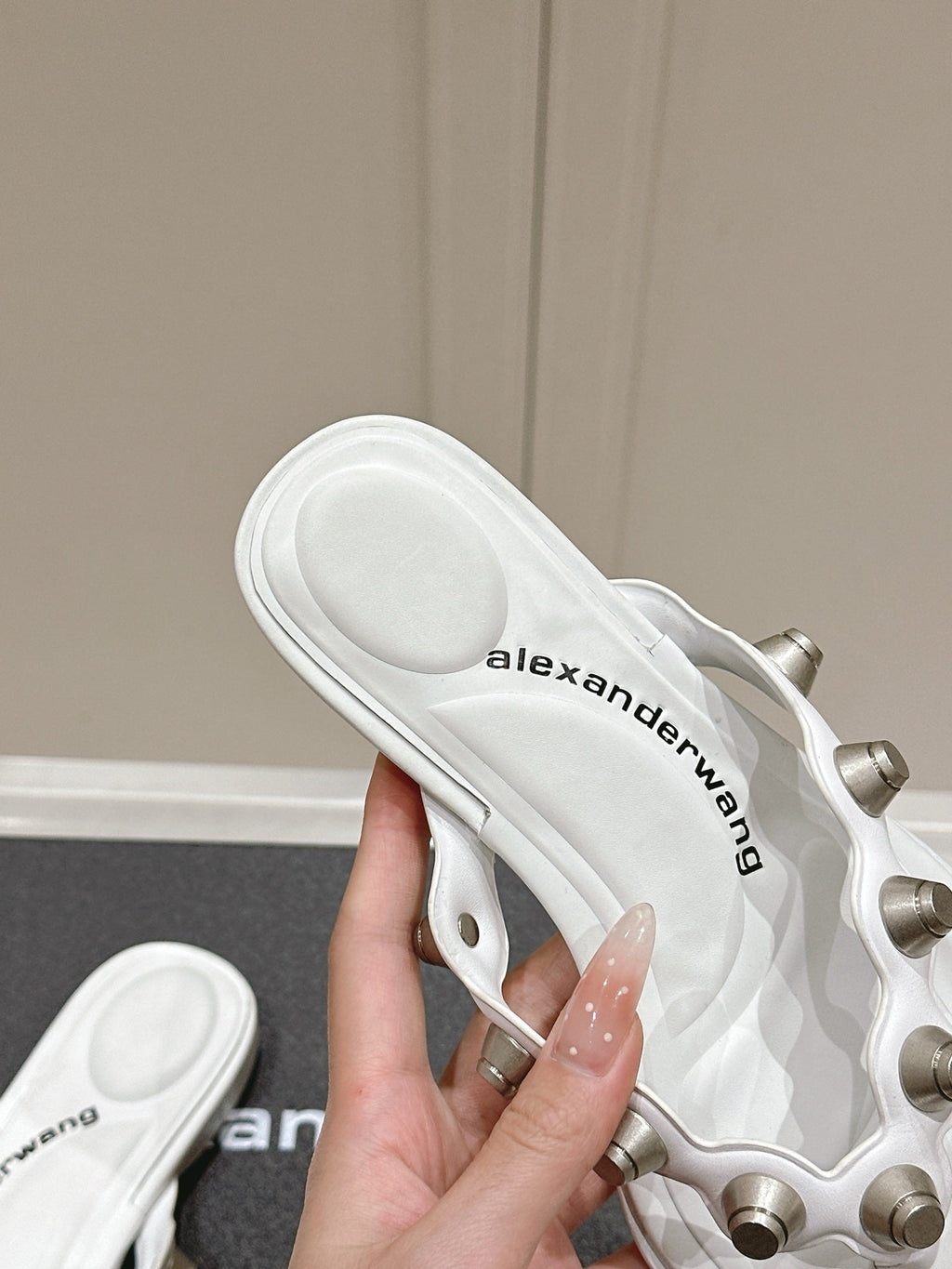 RHODES STUDDED THONG SANDALS IN WHITE CALFSKIN