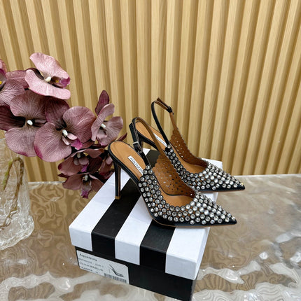 AQUAZZURA 26S SLINGBACK PUMPS 105 MM IN BLACK CALFSKIN WITH CRYSTAL