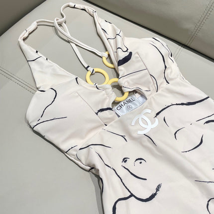 CC BIKINI SWIMSUIT SET IN CREAMY WHITE MIXED WITH CURVED BLACK DETAIL 608919