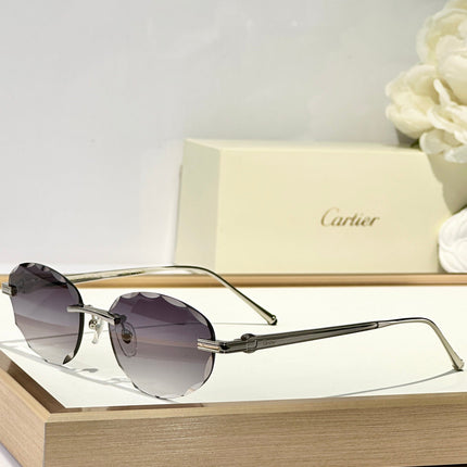 C DE RIMLESS ROUND FRAME SUNGLASSES CT0611S IN METAL