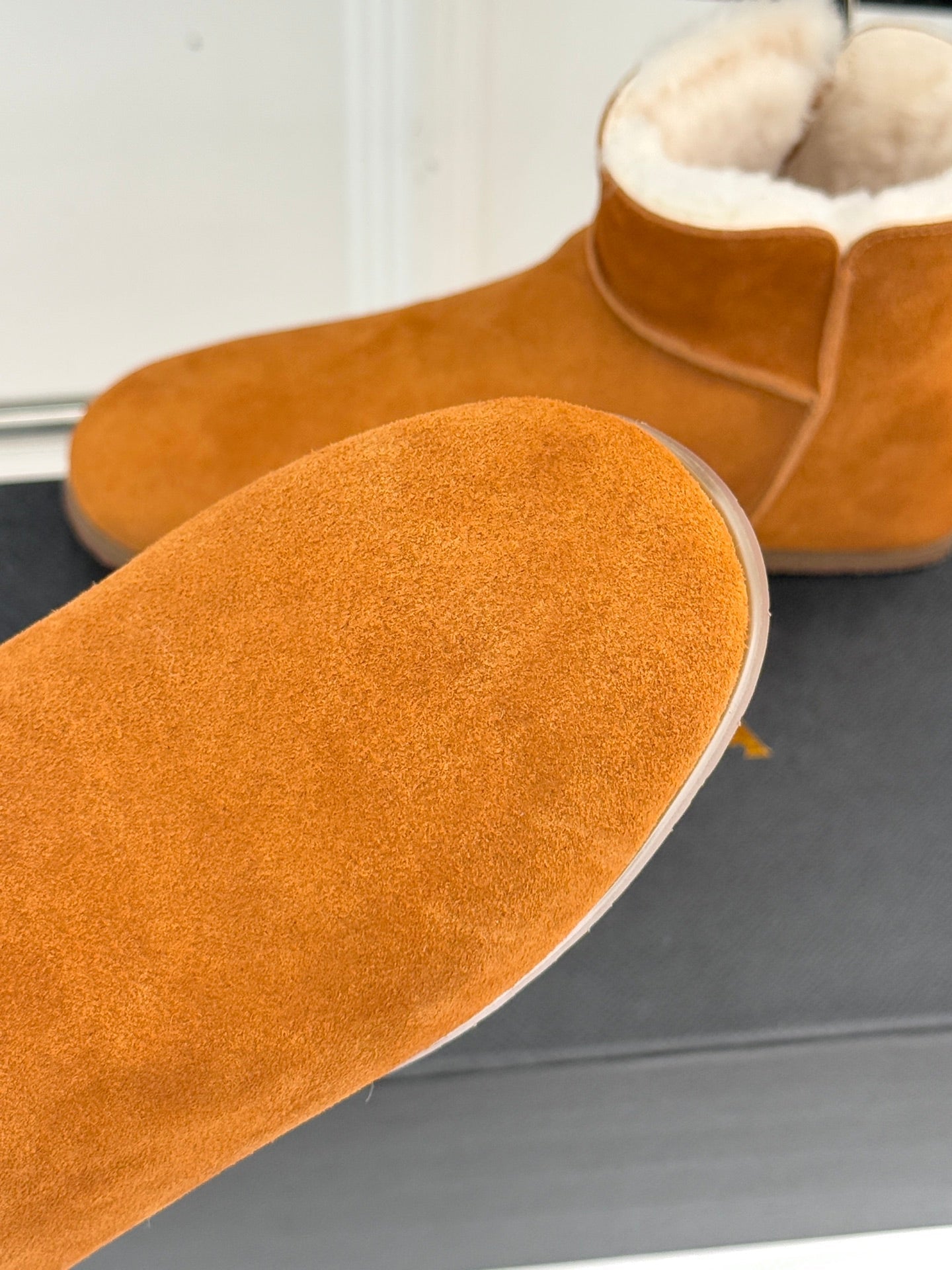 ALAIA 26S SNOW BOOTS IN DARK ORANGE SUEDE AND WOOL
