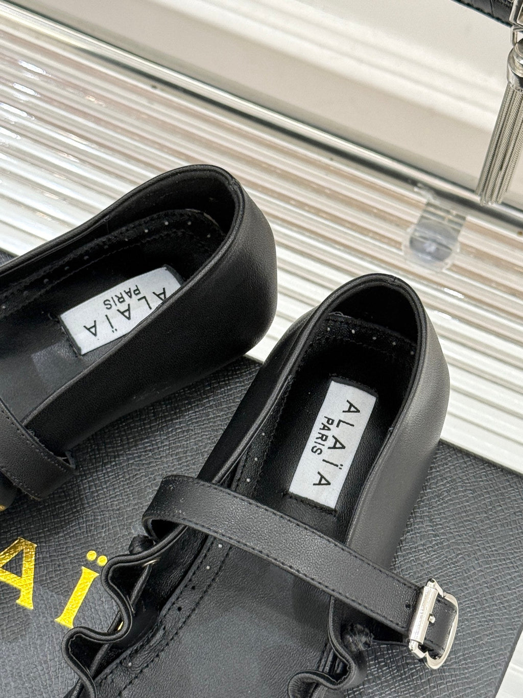 ALAIA 26S MARY JANE FLATS IN BLACK LAMBSKIN WITH BOW