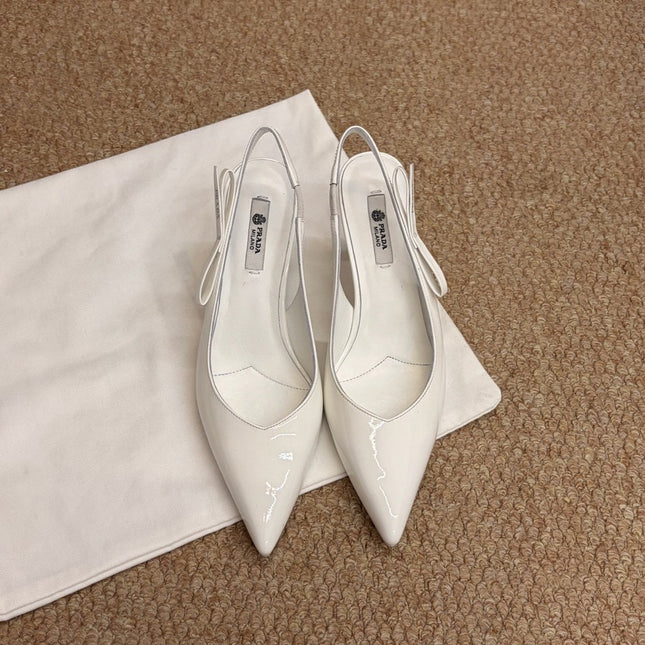 PRADA 26S SLINGBACK PUMPS IN WHITE PATENT CALFSKIN