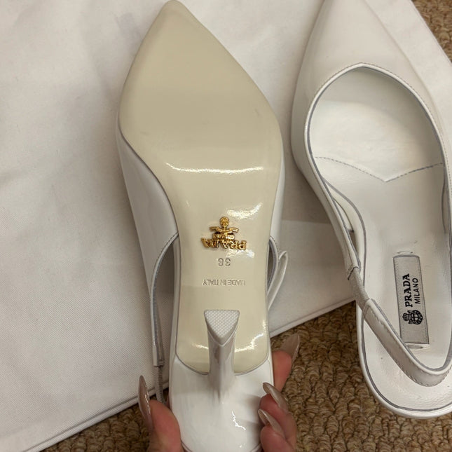 PRADA 26S SLINGBACK PUMPS IN WHITE PATENT CALFSKIN