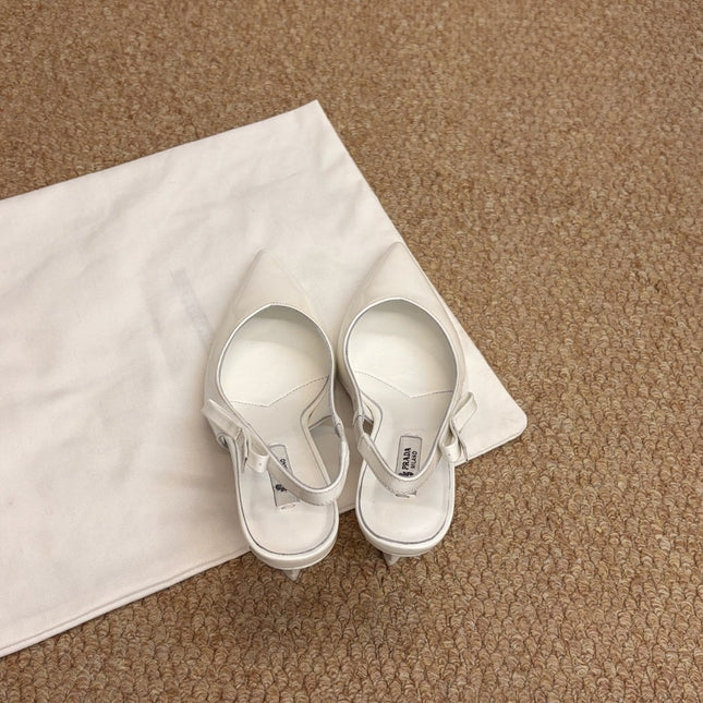 PRADA 26S SLINGBACK PUMPS IN WHITE PATENT CALFSKIN