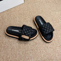 CHANEL 26S SLIDE SANDALS IN BLACK QUILTED CALFSKIN WITH LOGO PLAQUE