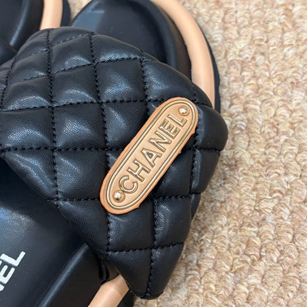 CHANEL 26S SLIDE SANDALS IN BLACK QUILTED CALFSKIN WITH LOGO PLAQUE