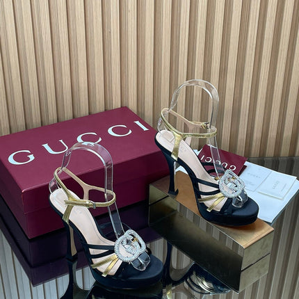 GUCCI 26S HIGH-HEELED SANDALS 125 MM IN BLACK SATIN AND GOLD CALFSKIN
