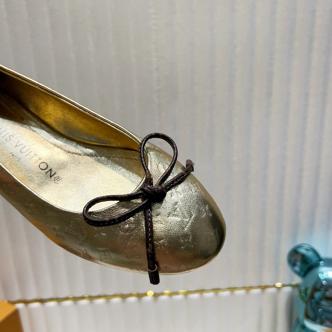 LV 26S BALLET FLATS IN GOLD MONOGRAM CALFSKIN WITH BOW