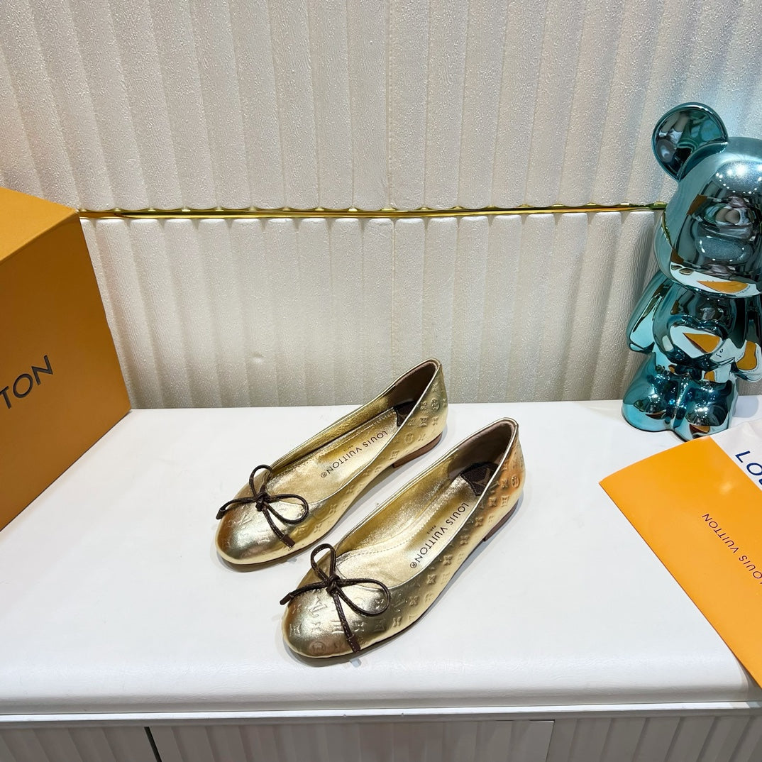 LV 26S BALLET FLATS IN GOLD MONOGRAM CALFSKIN WITH BOW
