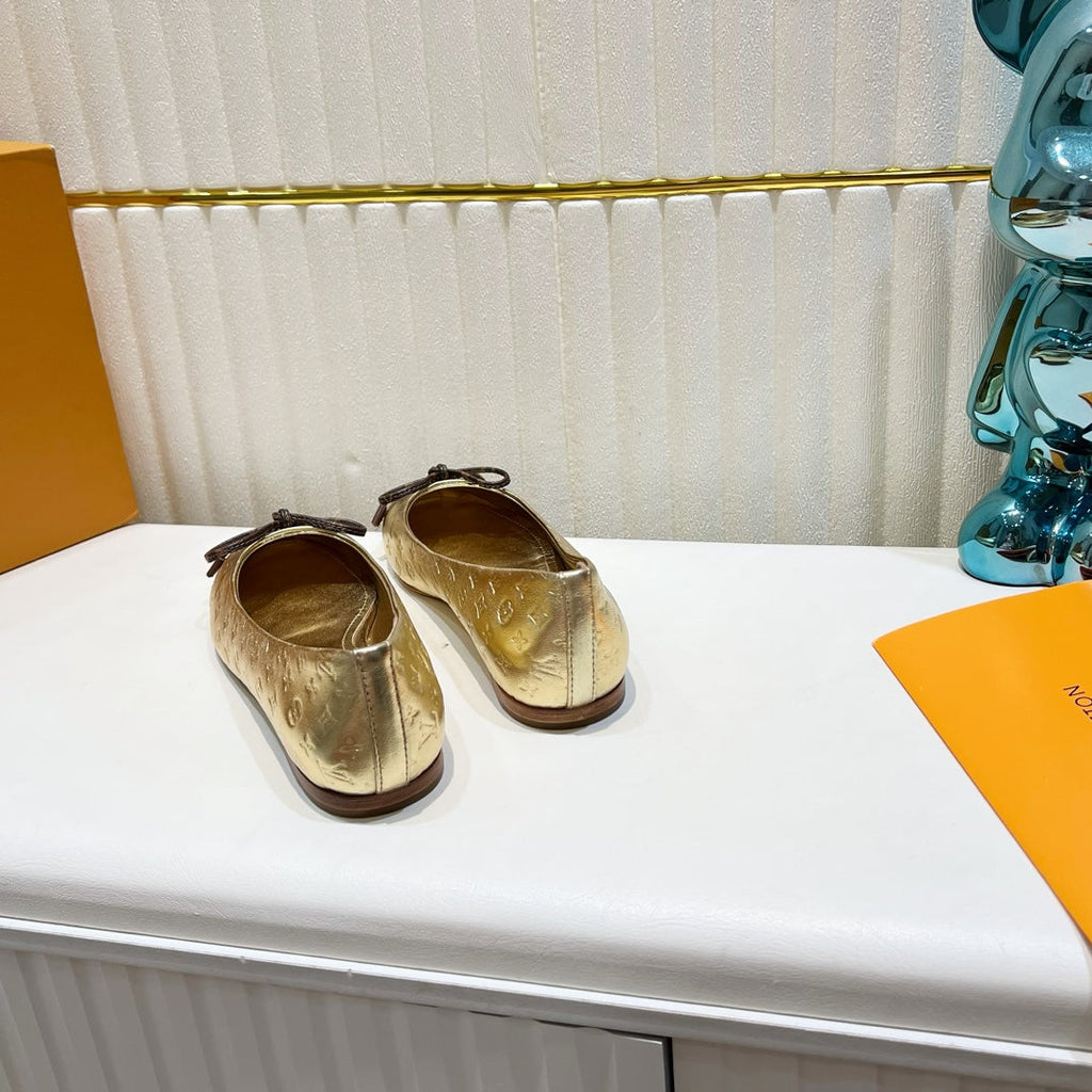LV 26S BALLET FLATS IN GOLD MONOGRAM CALFSKIN WITH BOW