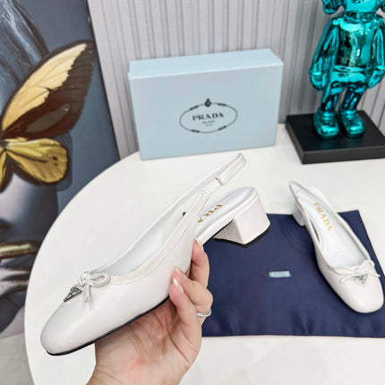 PRADA 26S ROUND TOE SLINGBACK PUMPS 40MM IN WHITE CALFSKIN WITH BOW