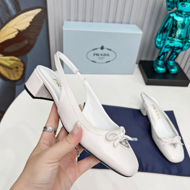 PRADA 26S ROUND TOE SLINGBACK PUMPS 40MM IN WHITE CALFSKIN WITH BOW