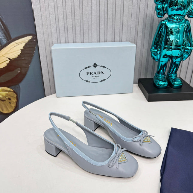 PRADA 26S ROUND TOE SLINGBACK PUMPS 40MM IN LIGHT BLUE CALFSKIN WITH BOW