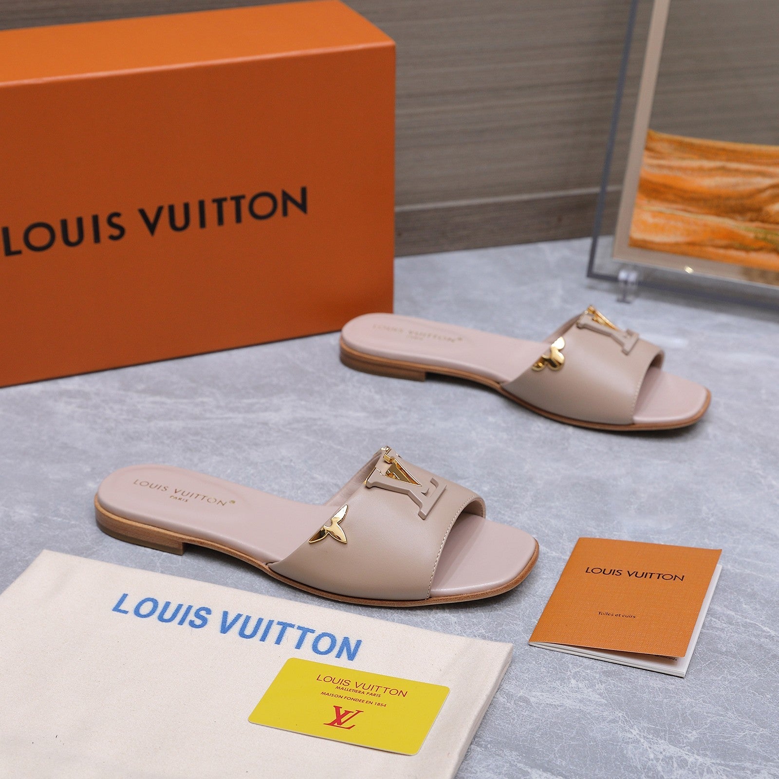 LV 26S FLAT SLIDE SANDALS IN NUDE PINK CALFSKIN GOLD HARDWARE