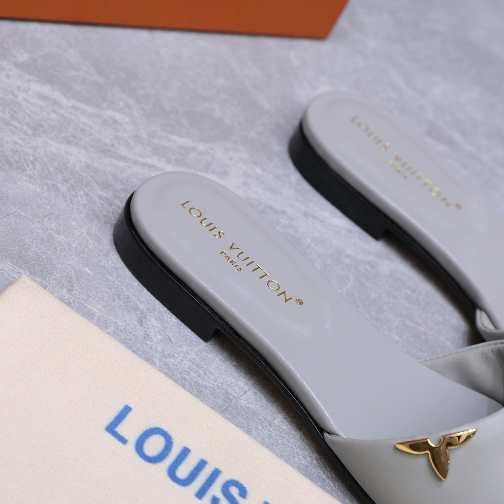 LV 26S FLAT SLIDE SANDALS IN LIGHT GREY CALFSKIN GOLD HARDWARE