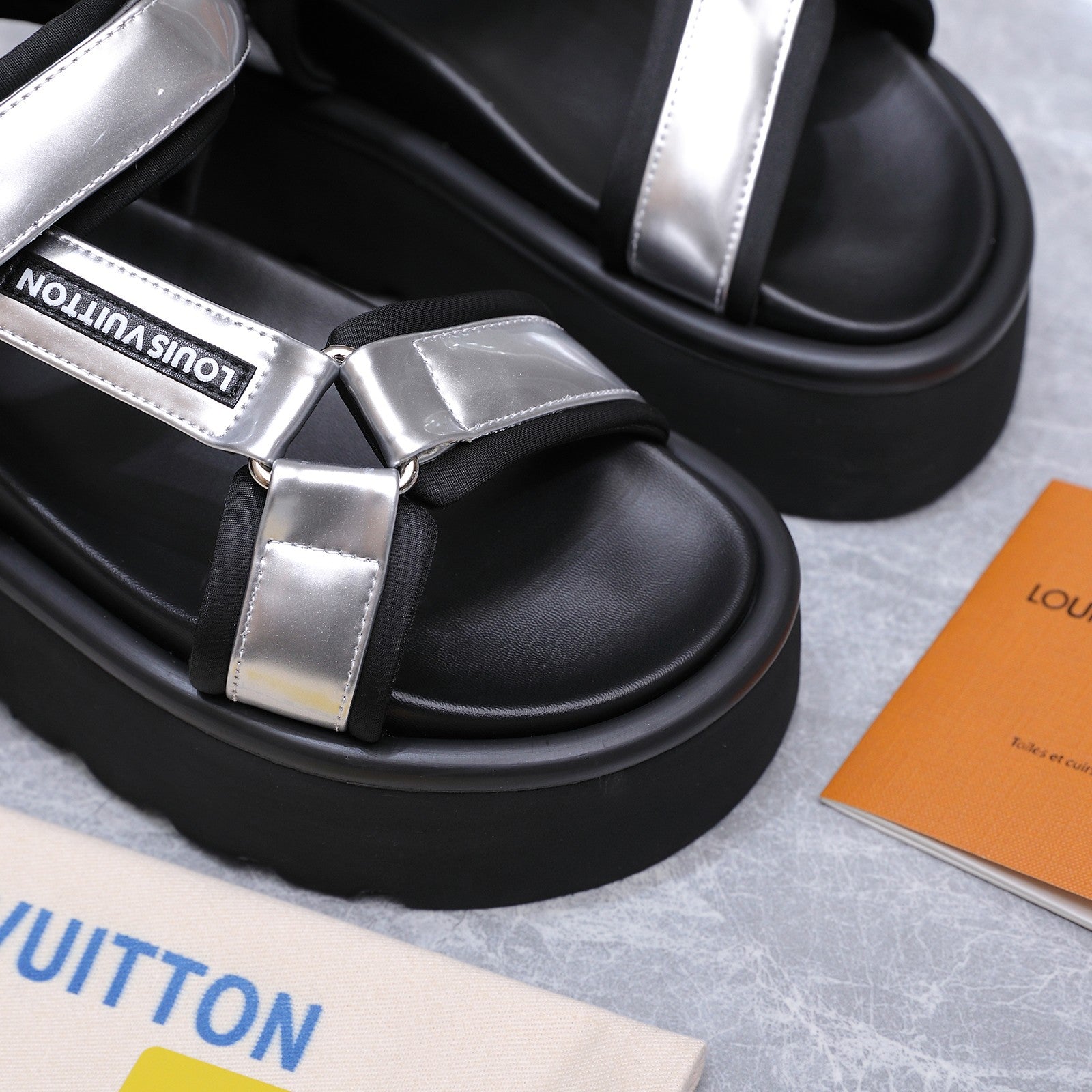 LV 26S CHAMELEON PLATFORM SANDALS 60MM IN SILVER AND BLACK CALFSKIN AND EVA