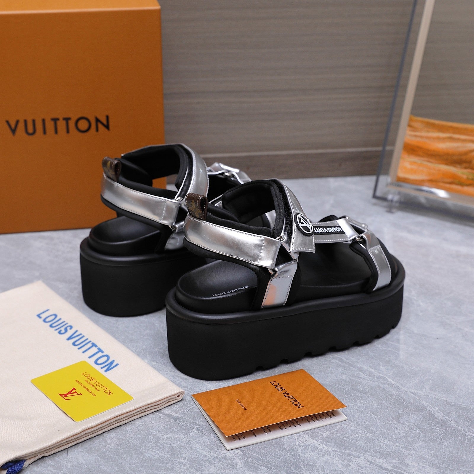 LV 26S CHAMELEON PLATFORM SANDALS 60MM IN SILVER AND BLACK CALFSKIN AND EVA