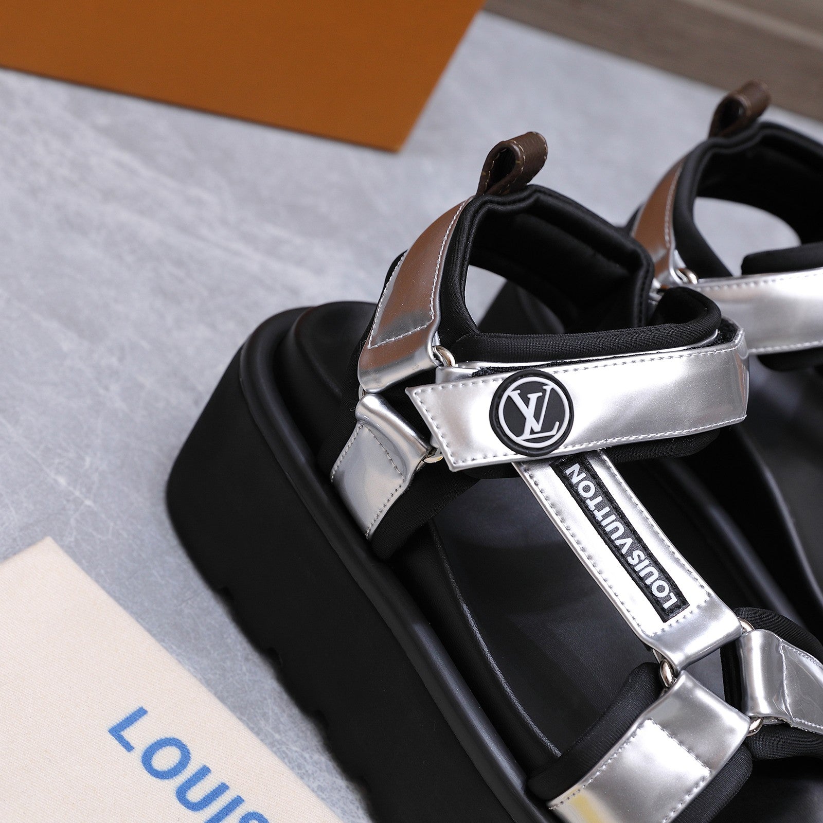 LV 26S CHAMELEON PLATFORM SANDALS 60MM IN SILVER AND BLACK CALFSKIN AND EVA