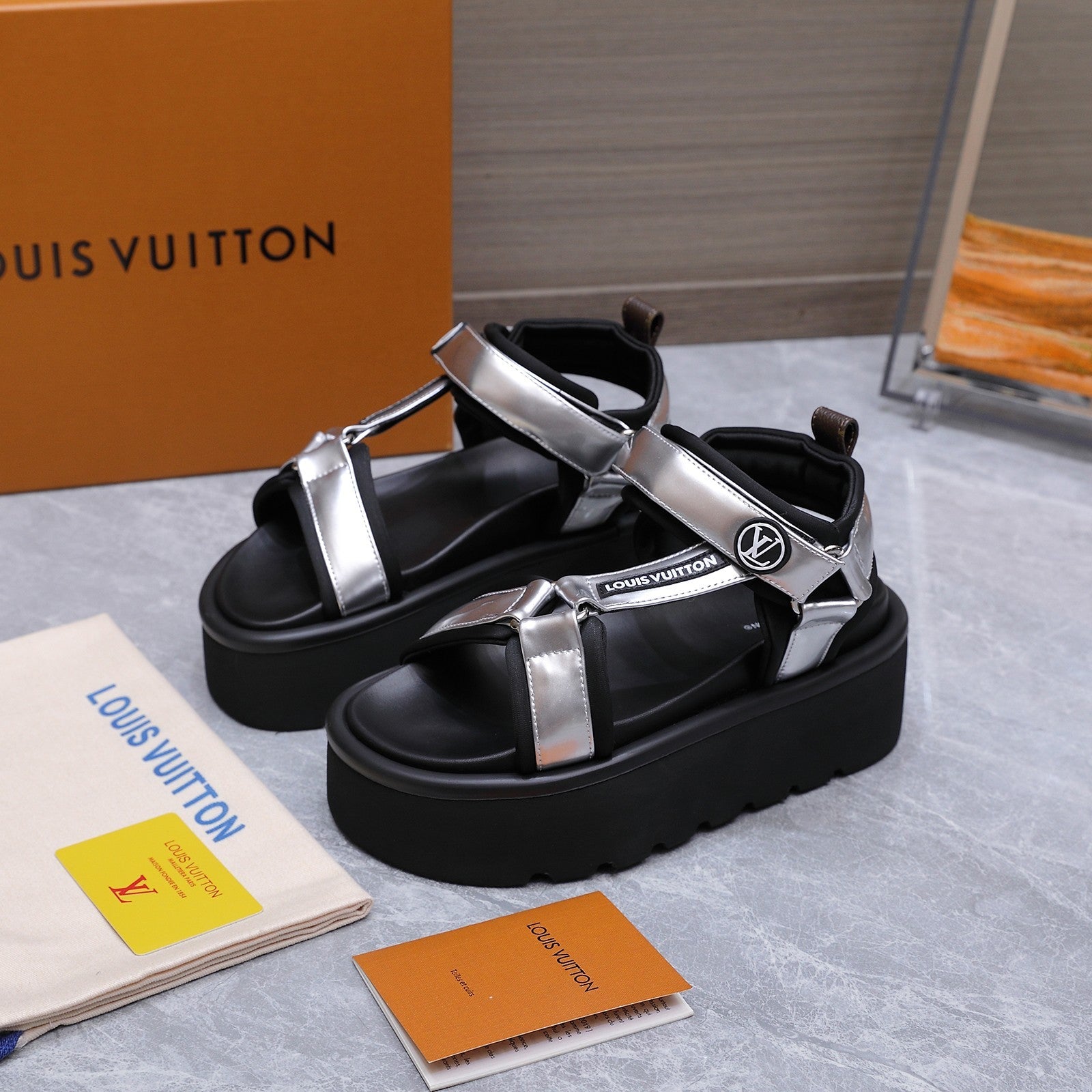 LV 26S CHAMELEON PLATFORM SANDALS 60MM IN SILVER AND BLACK CALFSKIN AND EVA