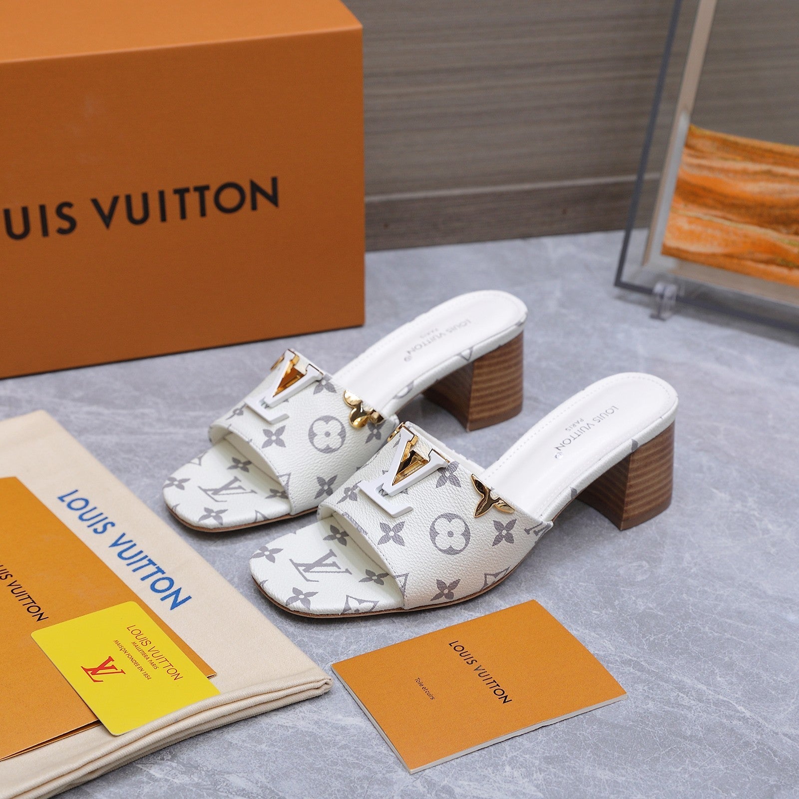 LV 26S BLOCK HEEL MULE SANDALS 55MM IN WHITE MONOGRAM CALFSKIN GOLD HARDWARE