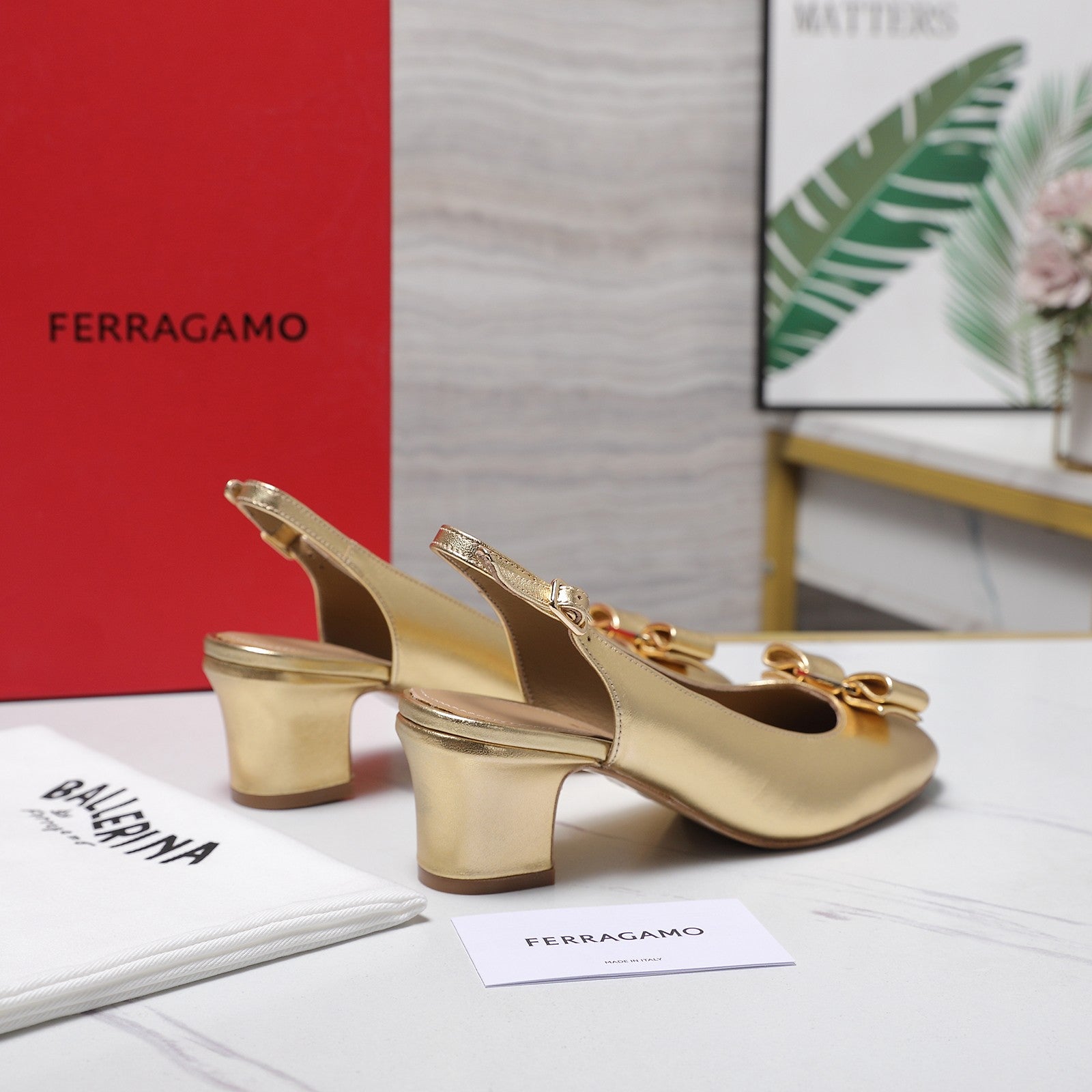 LV 26S SLINGBACK PUMPS 55MM IN GOLD PATENT CALFSKIN WITH BOW