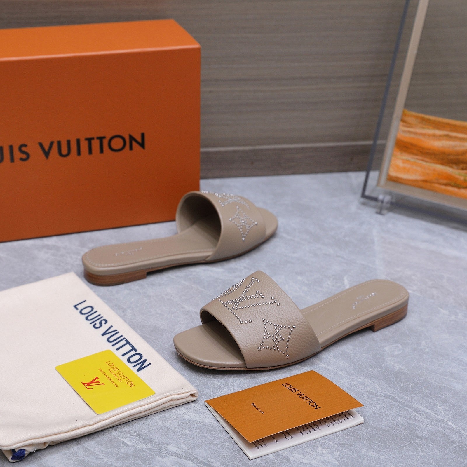LV 26S FLAT SLIDE SANDALS IN NUDE BROWN CALFSKIN
